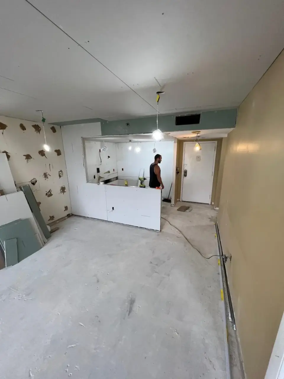 Before: Old kitchen setup before full construction - Miami apartment